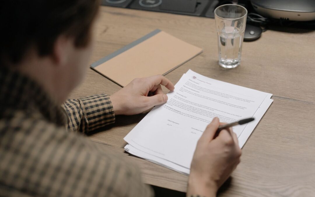 Director reviewing company documents before signing, illustrating upkeep of a Thai shareholder register